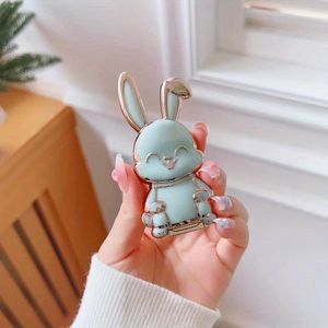 Electroplated mobile phone bracket rabbit back-mounted mobile phone bracket push-pull folding bracket portable bracket