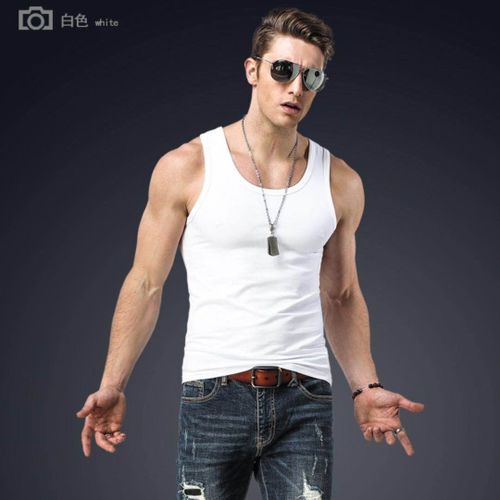 Premium Photo  A man in a white tank top with a muscular body