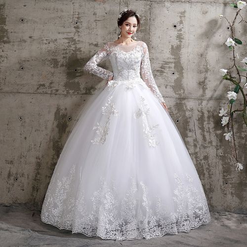 Beaded White Wedding Dress - Sunika Magazine
