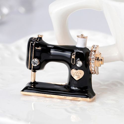 Black sewing machine brooch online