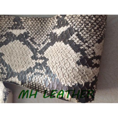 Black and top white snakeskin clutch