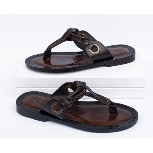 Fashion Open-toe, open-heel slip-on design.