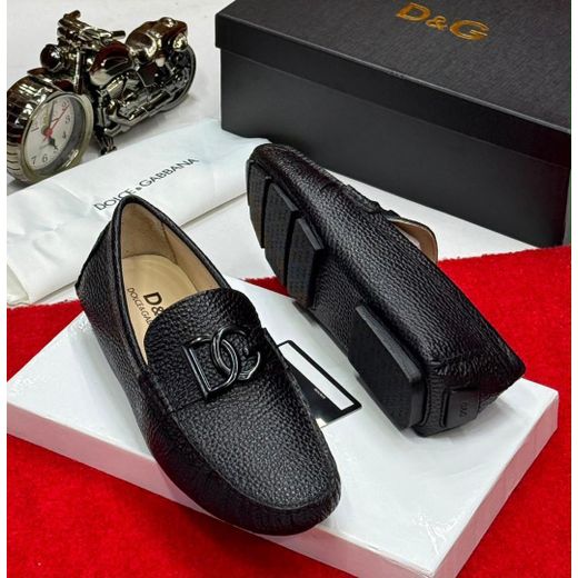 Black slip-on driving loafer.