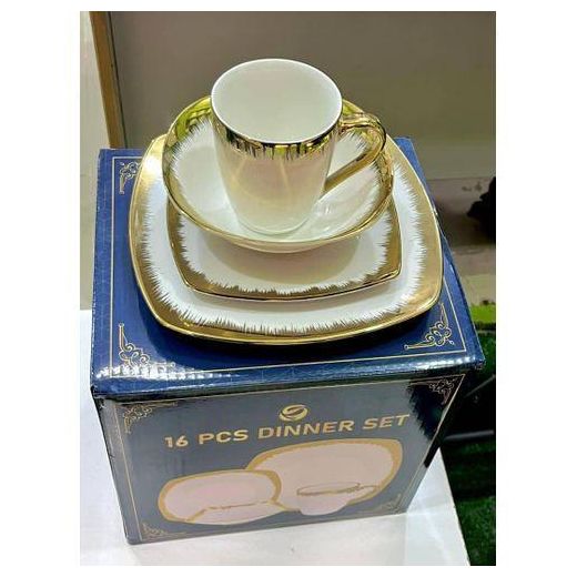 Luxury 16-Piece Ceramic Dinner Set styled with an elegant white base and a feathered gold trim.