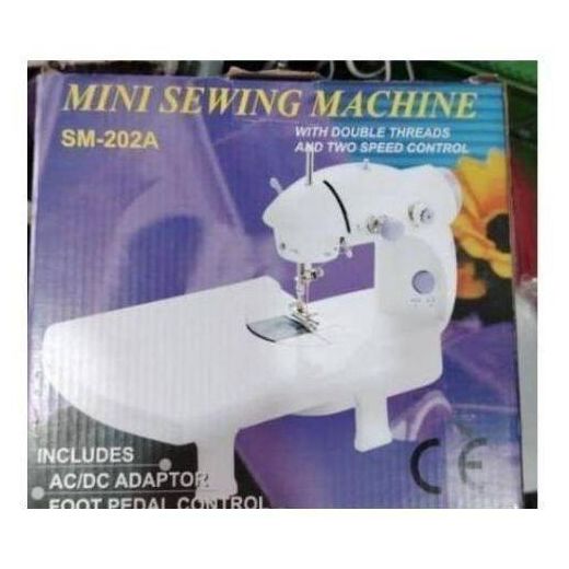 Electric mini sewing machine with foot pedal