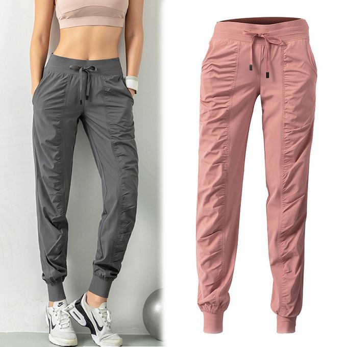 Womens Quick Dry Tatting Fabric Drawstring Running Capris With Two Side  Pockets Athletic Fitness Joggers And Yoga Sweatpants From Lizhirou, $17.69