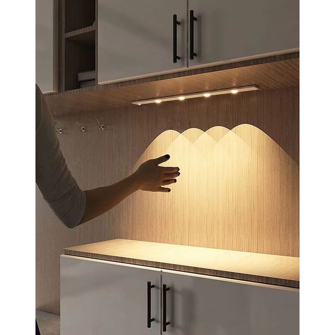 Rechargeable LED cabinet light installed under kitchen cabinet