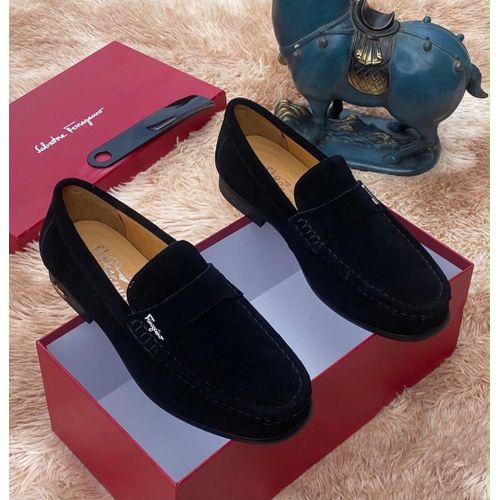 Black suede leather slip-on loafer.