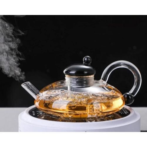 heat-resistant borosilicate glass teapot features a removable infuser for loose-leaf tea and is designed to be safe for heating directly on stove tops or electric hot plates